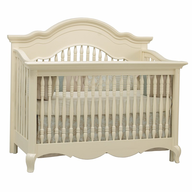 beige baby crib 