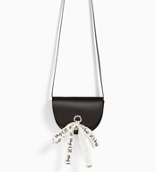 zara handbag with bow and slogan